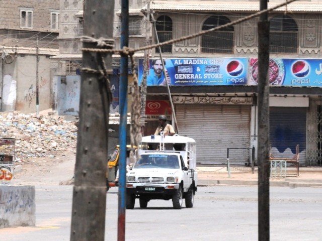 Pakistani paramilitary soldiers patrol the streets