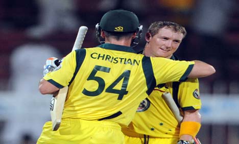 Daniel Christian and George Bailey celebrate after securing the win on August 29, 2012 Daniel Christian and George Bailey celebrate after securing the win on August 29, 2012
