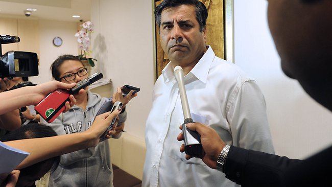 India's high commissioner to Singapore T.C.A Raghavan speaks to journalists at the Mount Elizabeth hospital after the announcement of the death of the Indian gang-rape victim in Singapore. Picture: AFP/Roslan Rahman