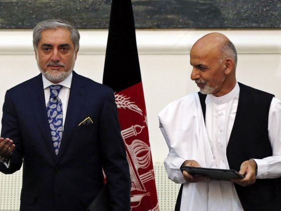 Historic, anxious handover as Afghanistan swears in new leader